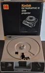 Kodak Ektagraphic Iii Plus 35MM Slide Projector W/ Two (2) Universal Trays Used. Price: $80.00.