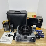 Kodak Ektagraphic Iii Slide Projector W Lens, Tray, Remote, And Extra Bulbs Used. Price: $149.00.