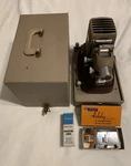 Vintage Cokesbury Model C500-C2 Film Strip Projector & Holiday Splicer Kit Used. Price: $60.00.