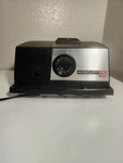 Airequipt 135 Desktop 2X2 Slide Projector Black 4" 3.5 Lumimag Table Used. Price: $42.00.