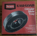 New Sealed Nos Sears Easi-load Circular Slide Tray. Price: $8.95.