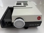 Leica Pradovit P-150 35MM Slide Projector W/HEKTOR-P2 Lens Used. Price: $210.00.