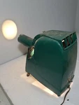 American Optical Projector Model 4901POWERS On. Price: $30.00.