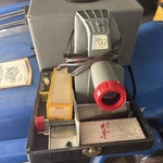 Vintage American Optical Model 4901 Projector W/slides & Case Works. Price: $25.00.