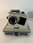 Revere Automatic Deluxe 35MM Slide Projector Model P-88BD Powers On, Untested Used. Price: $19.99.