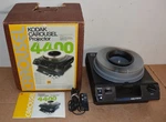 Kodak 4400 Carousel Slide Projector W/ Box, Tray & Remote Used. Price: $100.00.