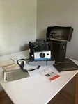 Vintage Polaroid Automatic Model 210 Land Camera Kodak & Case Not Tested. Price: $30.00.