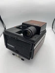 Vintage Bell & Howell RC55 Slide Cube Projector W/ Manual Used. Price: $49.95.