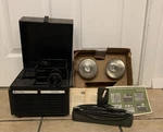 Vintage Bell & Howell Slide Cube Projector, Not Tested, Auto Focus W/ 2L Bulbs Used. Price: $55.00.