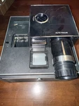 Bell & Howell Cube Projector 981Q Auto Focus Working W/ Remote Slides Used. Price: $124.00.