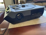 Kodak Medalist Carousel Slide Projector With Remote, Extra Bulb, & Carry Case Used. Price: $89.00.