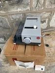 Leitz Wetzlar Pradolux Slide Projector W/ Original Box Works 110-120 V Germany Used. Price: $79.95.