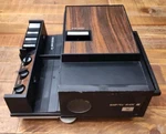 Vintage Sears Whisper Matic Iii 2X2 Slide Projector Woodgrain Used. Price: $30.00.