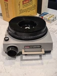 Kodak Ektagraphic 3 Slide Projector - Bulb Works, 2 Replacements Carousel, Box Used. Price: $90.00.