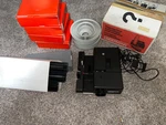 Vtg KINDERMANN-8703 Telefocus Projector- & Slides Germany Untested/ Parts. Price: $99.00.